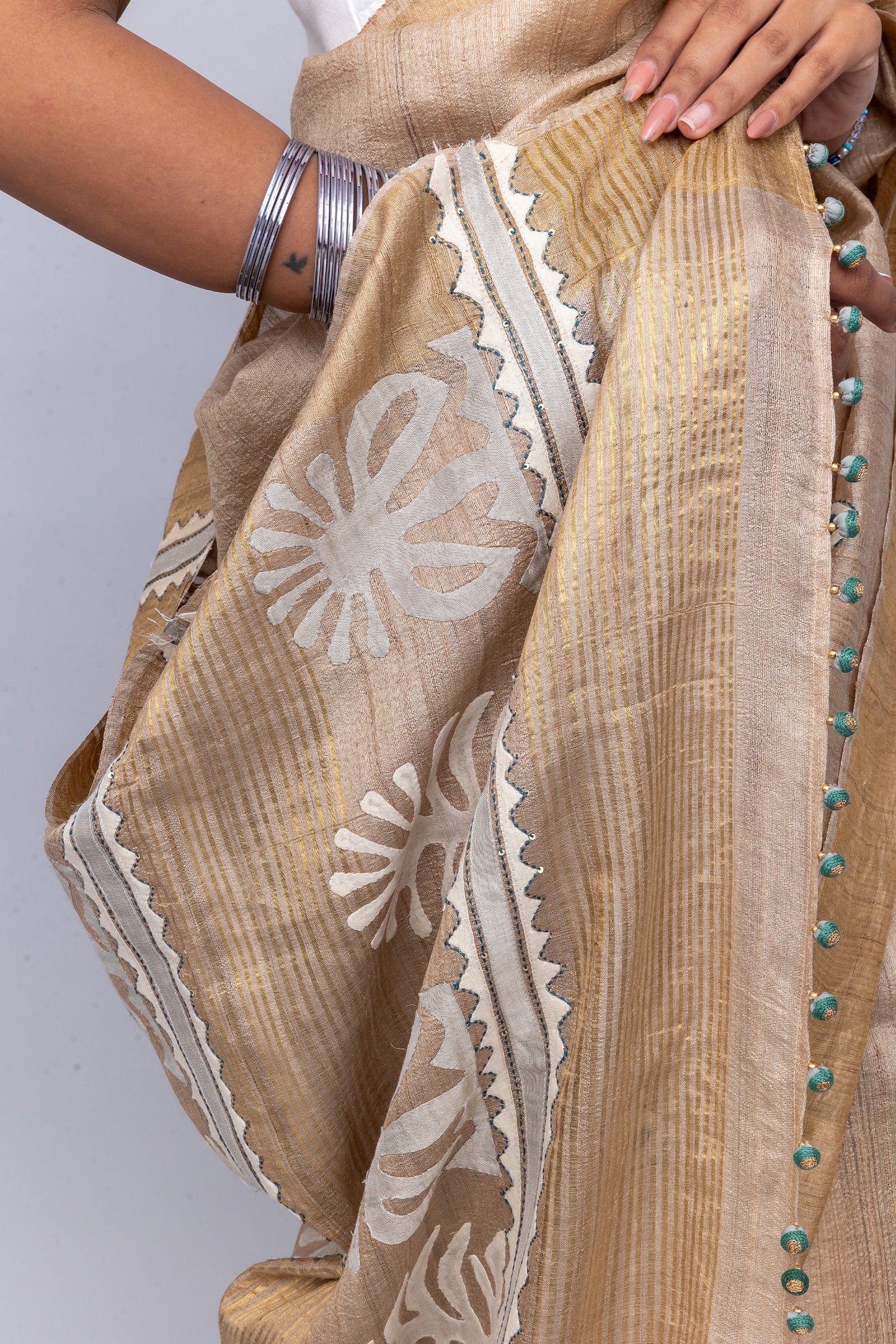 Festive Ivory Tussar Silk Saree With Handcrafted Appliqué and Floral Embroidery