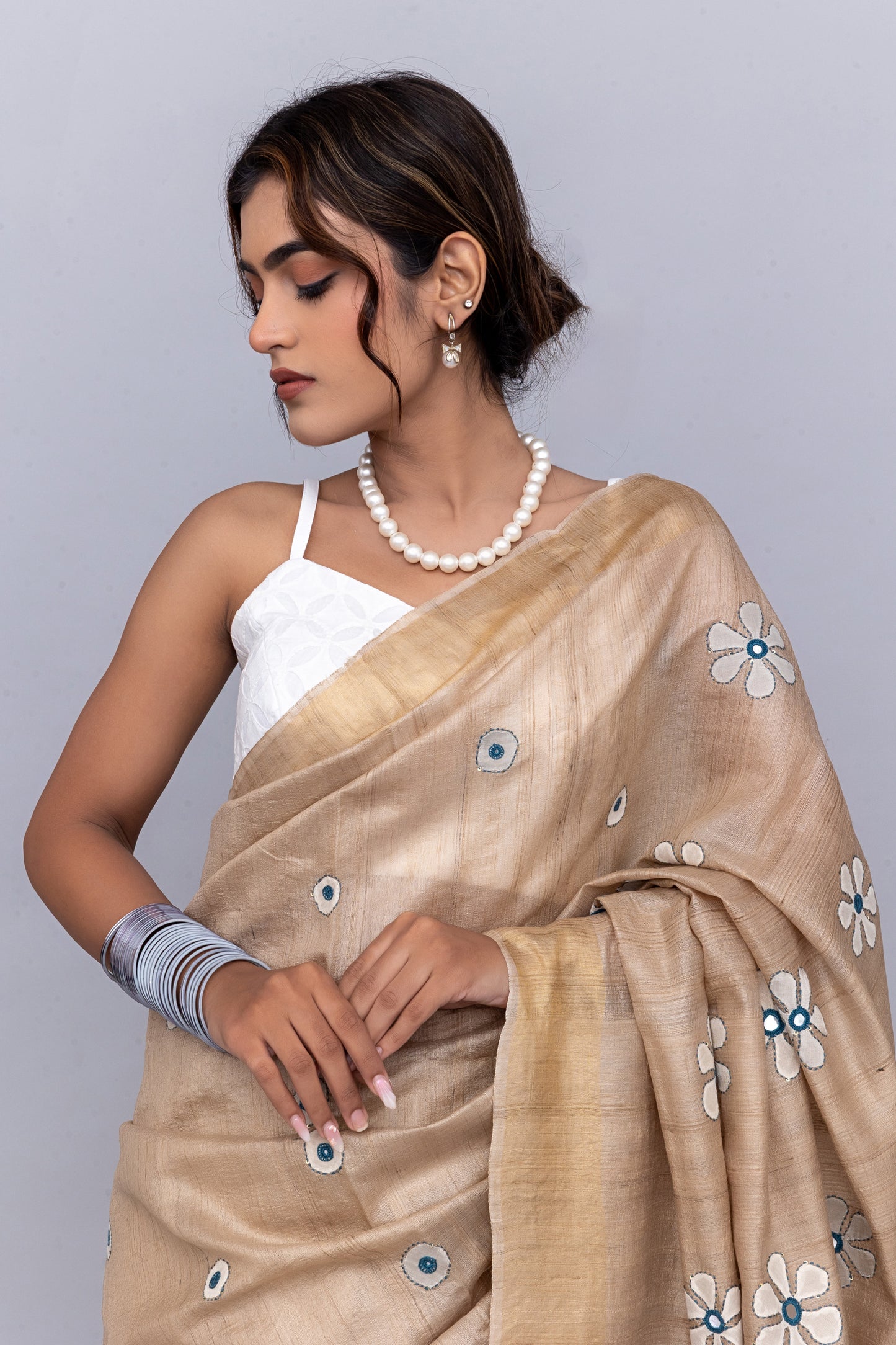 Festive Ivory Tussar Silk Saree With Handcrafted Appliqué and Floral Embroidery