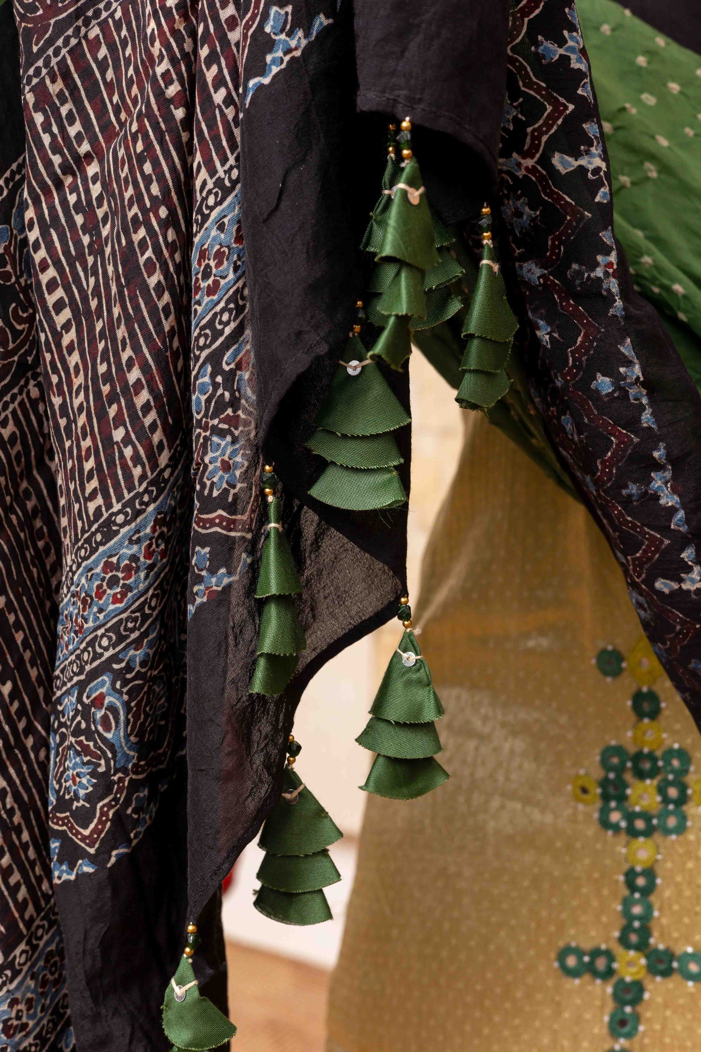Ajrakh Bandhani Dupatta In Green Decorated With Tassels