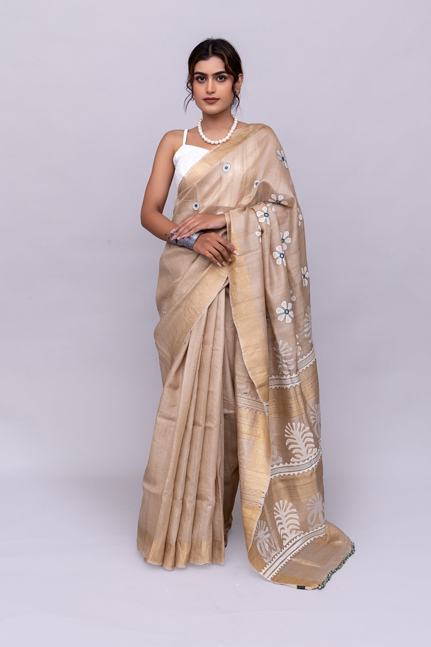 Festive Ivory Tussar Silk Saree With Handcrafted Appliqué and Floral Embroidery