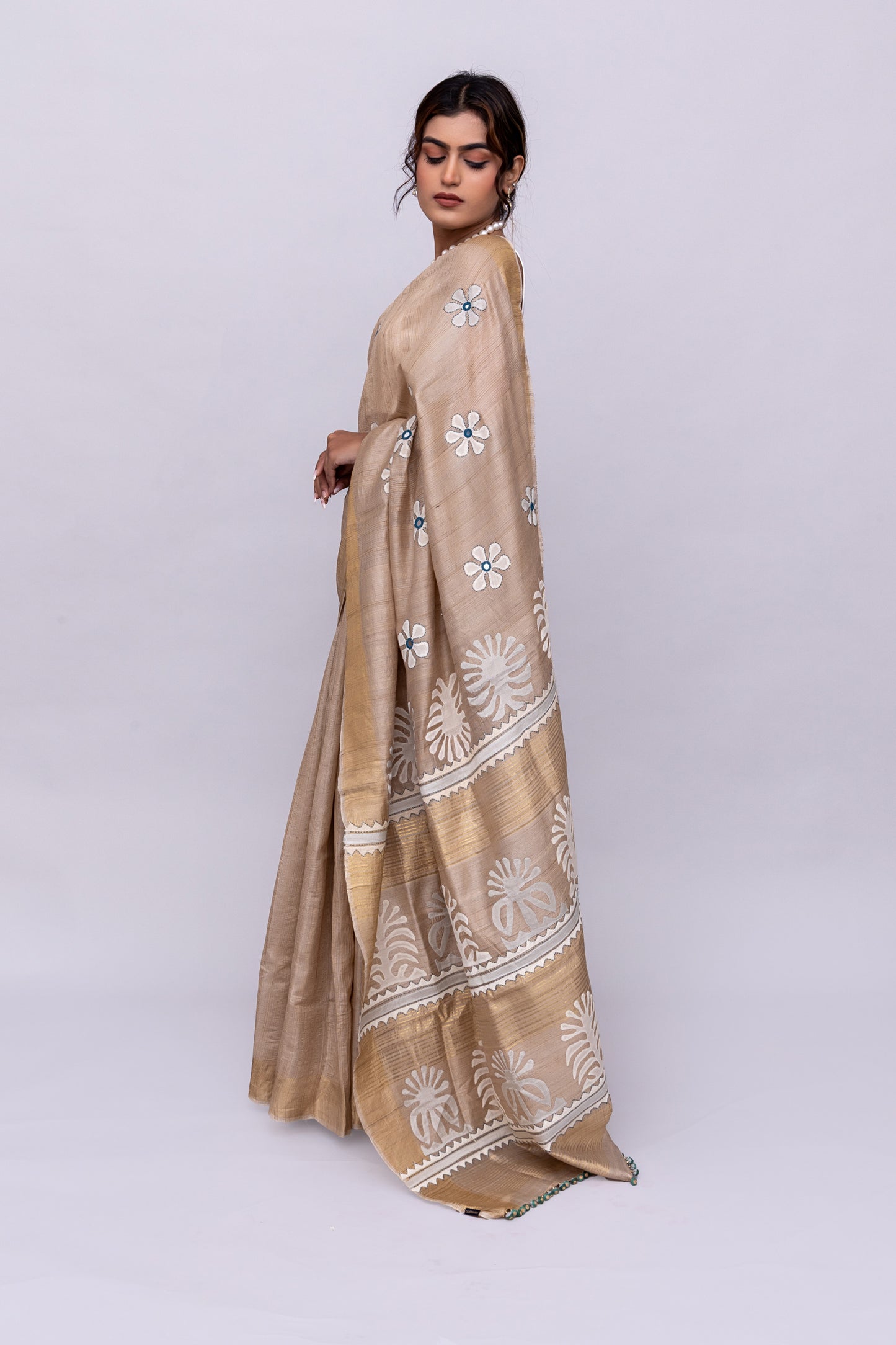 Festive Ivory Tussar Silk Saree With Handcrafted Appliqué and Floral Embroidery