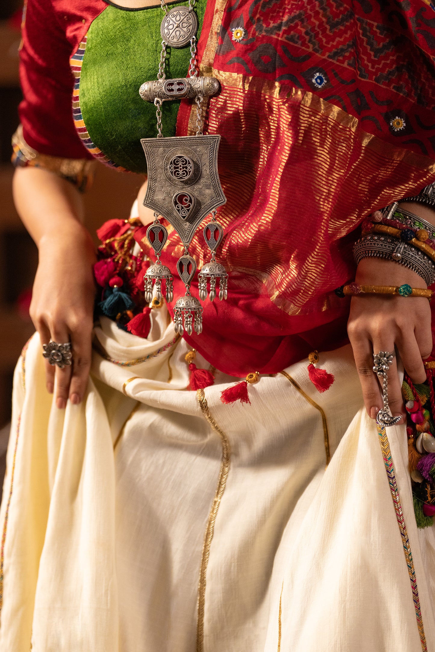 Fabulous Green Red Mashru Silk Embroidered Blouse