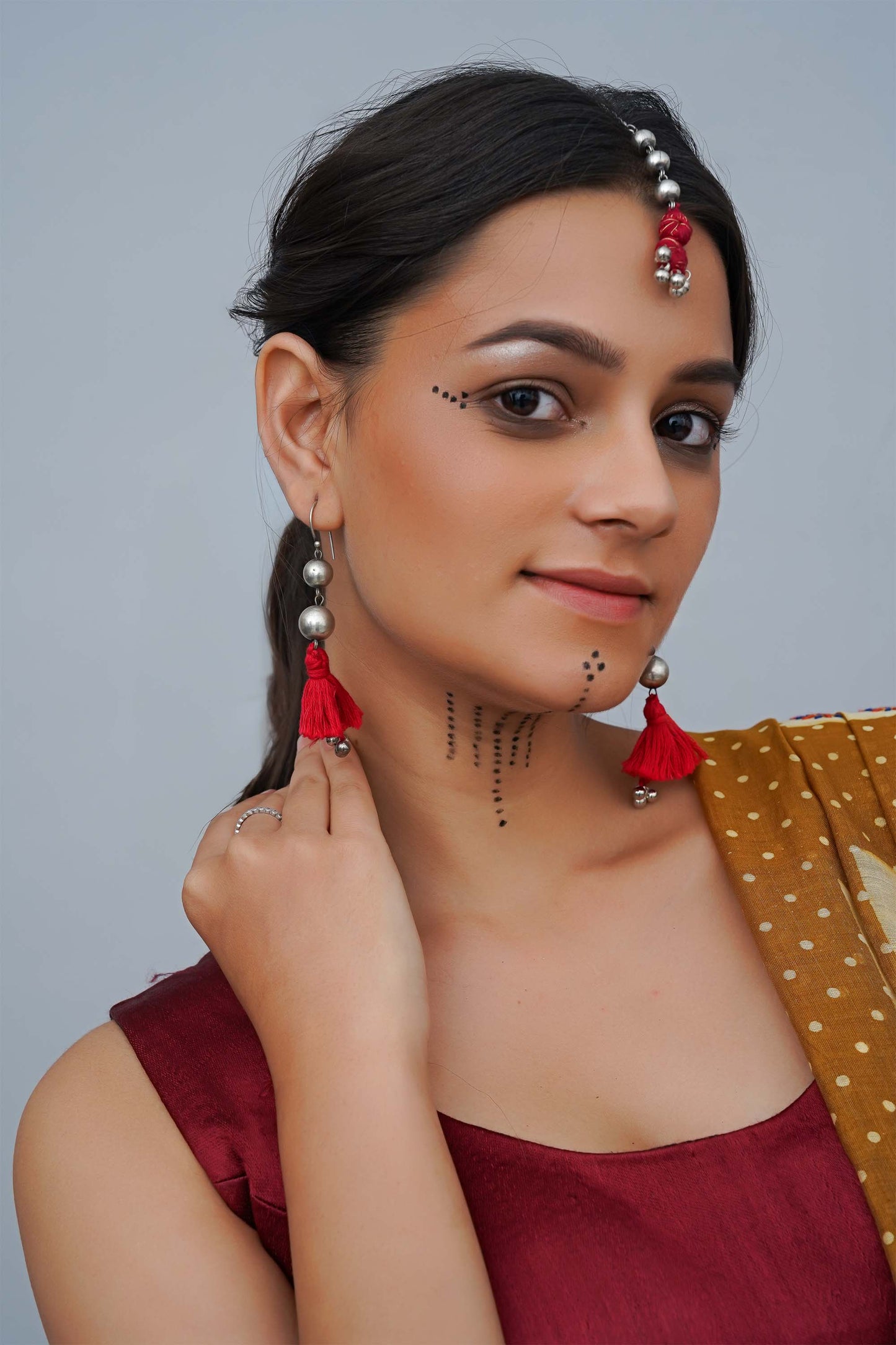 Red Oxidised Ball With Tassels Earring