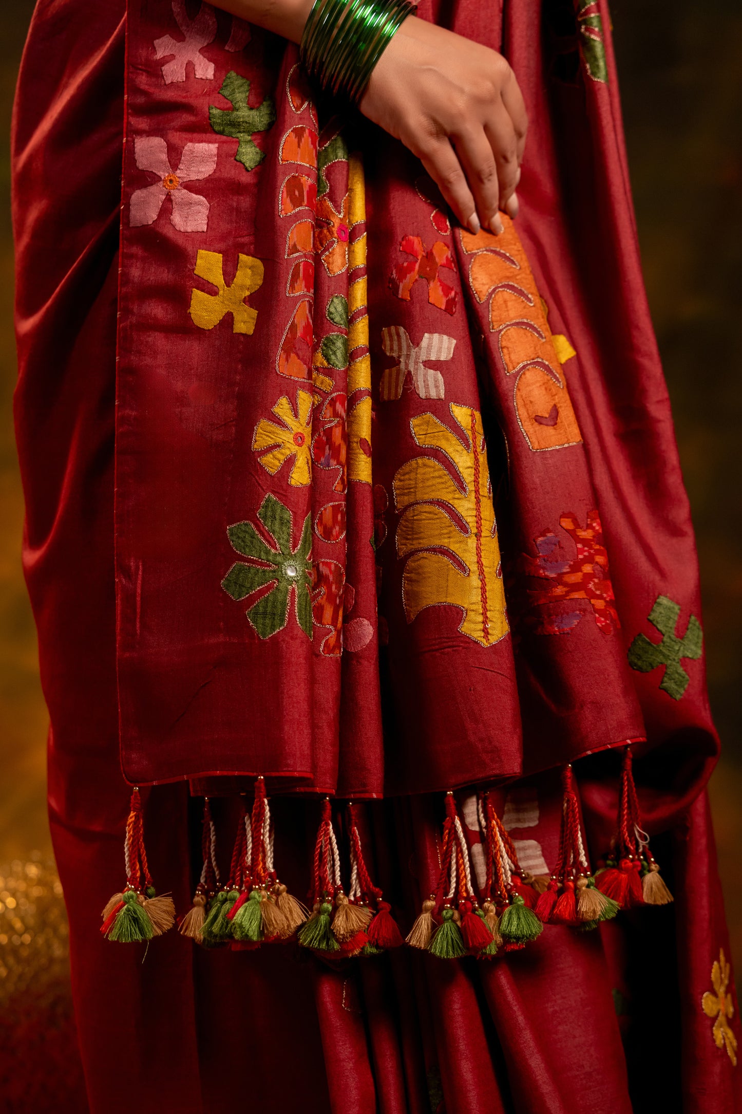 Exclusive Deep Red Satin Silk Saree With Hand-Cut Appliqué & Tassels