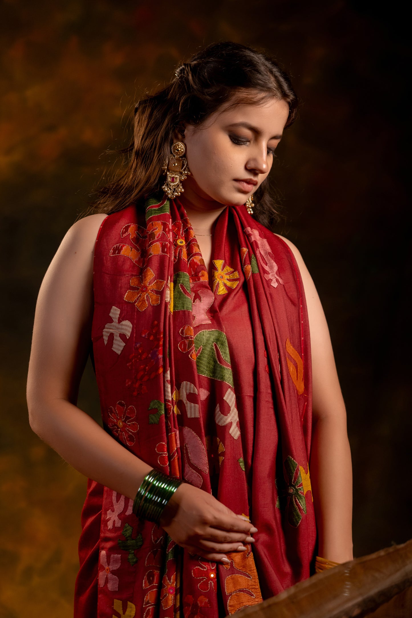 Exclusive Deep Red Satin Silk Saree With Hand-Cut Appliqué & Tassels