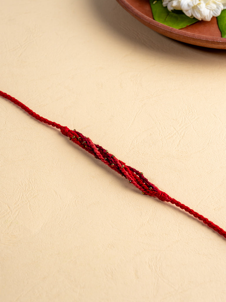 Hand-Twisted Strings Artisanal Red Rakhi