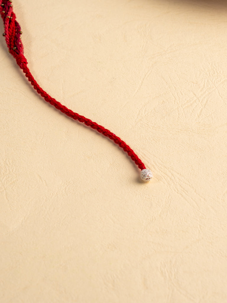 Hand-Twisted Strings Artisanal Red Rakhi