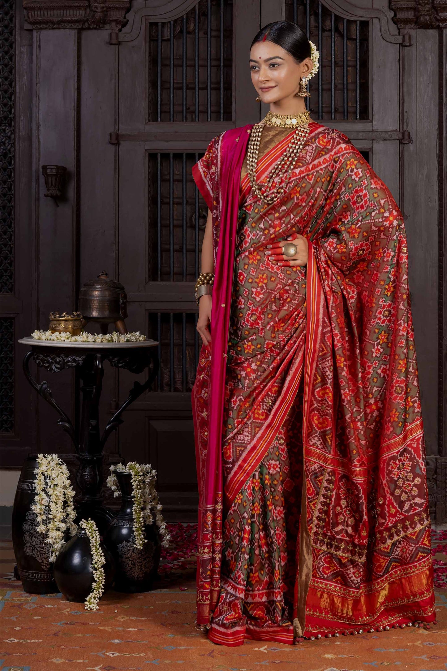 Handcrafted Green Patola Silk Saree With Khat Embroidery
