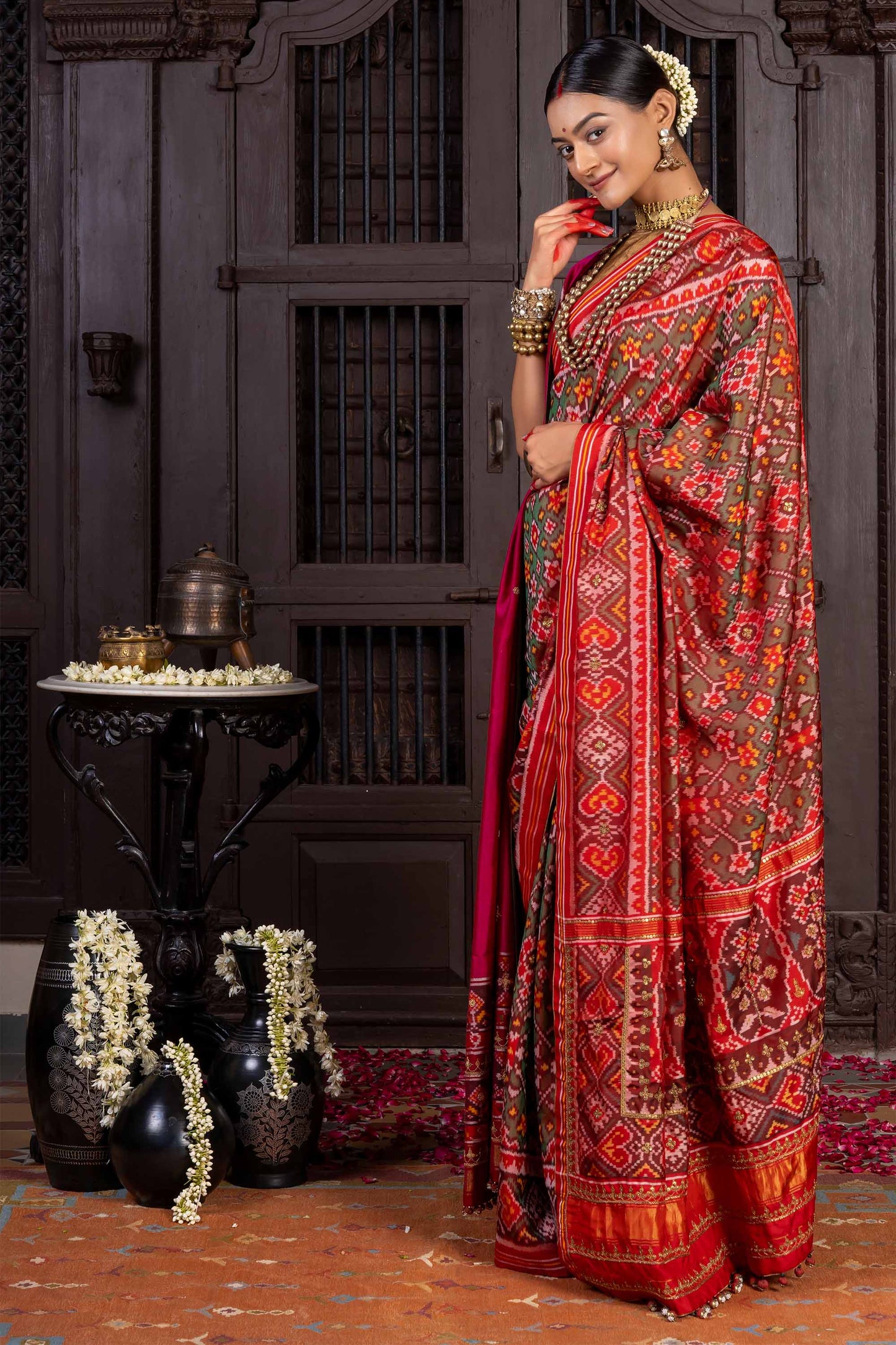 Handcrafted Green Patola Silk Saree With Khat Embroidery