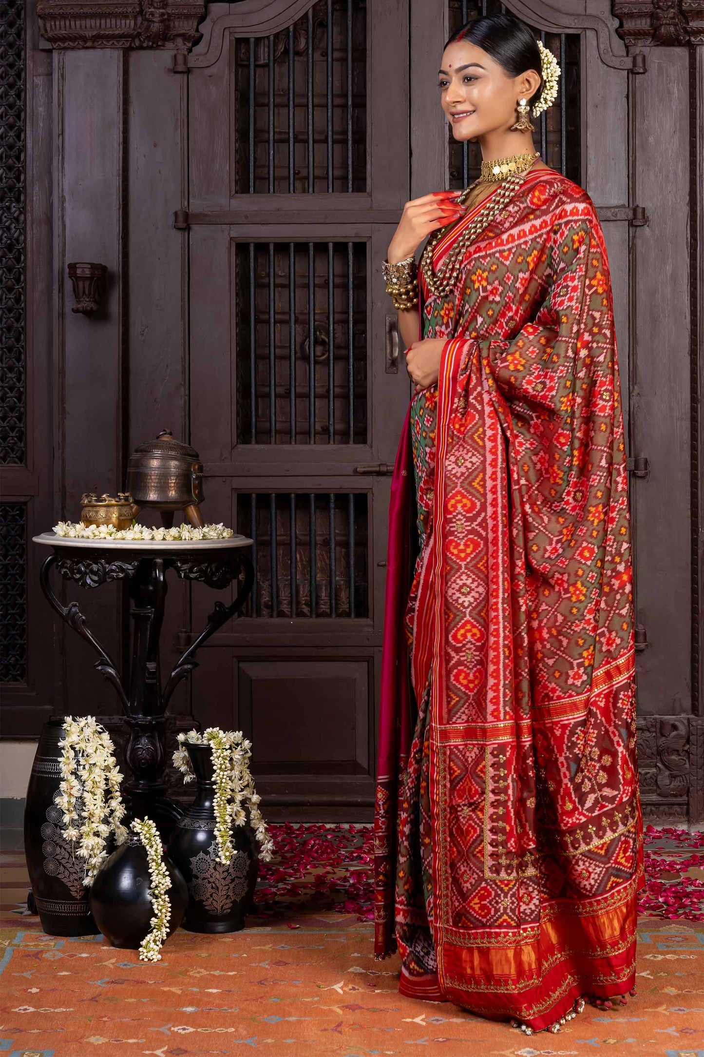 Handcrafted Green Patola Silk Saree With Khat Embroidery