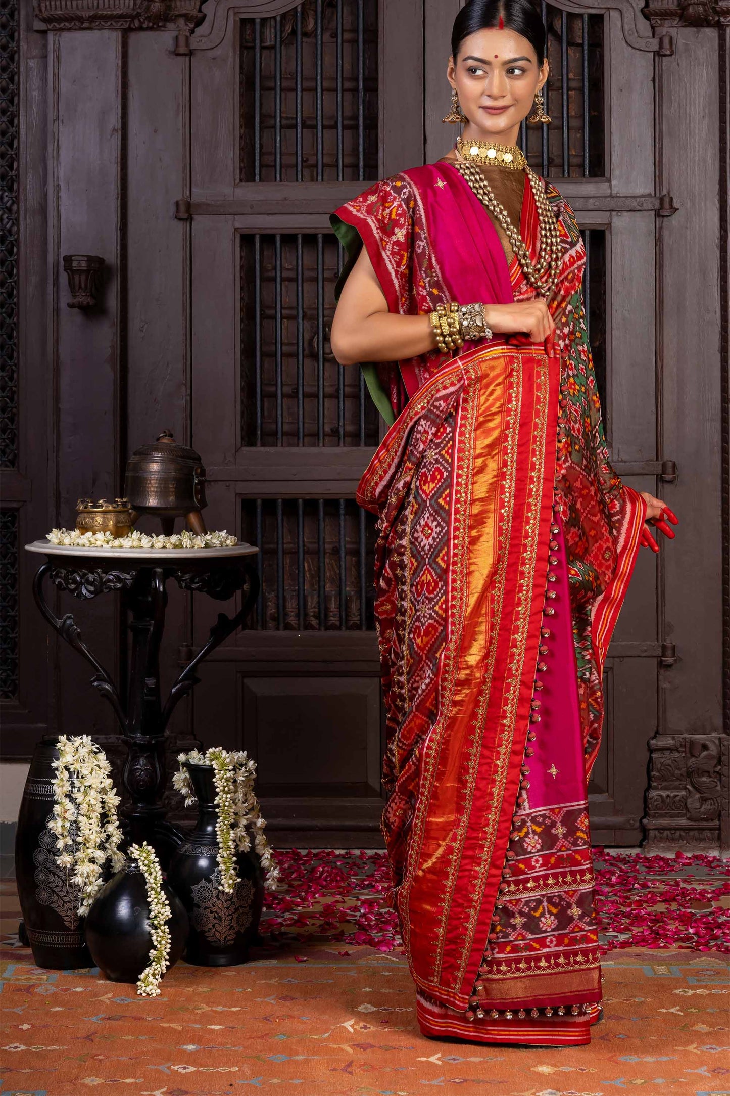 Handcrafted Green Patola Silk Saree With Khat Embroidery
