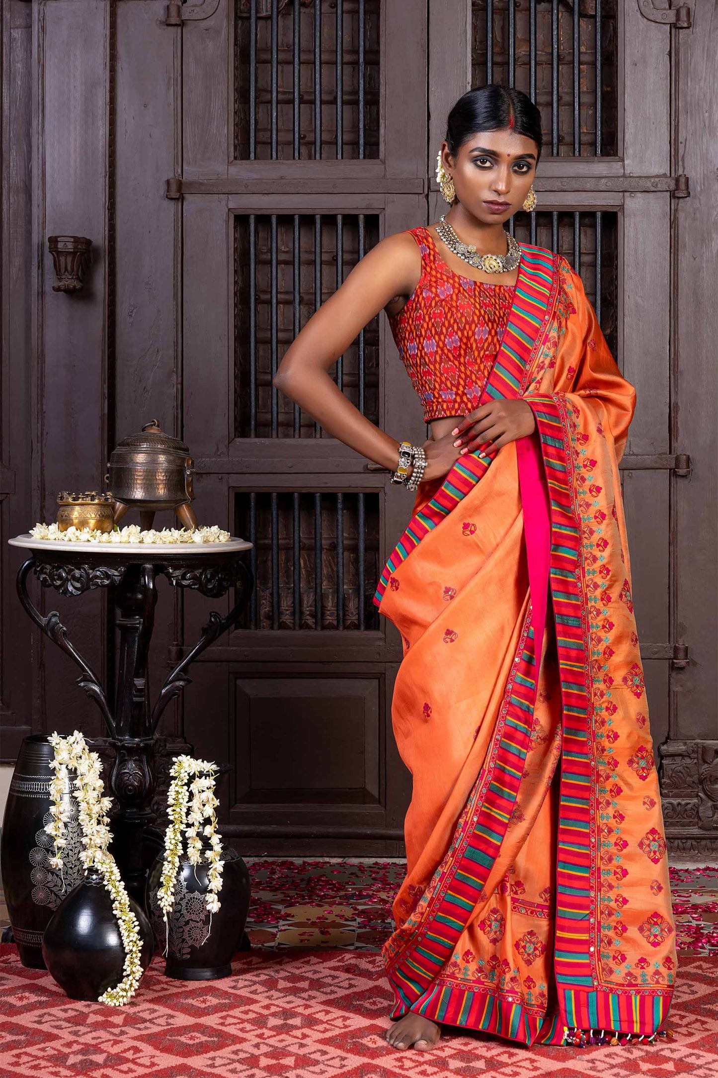 Handcrafted Bright Orange Silk Saree With Aari Embroidery