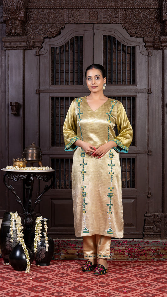 Ivory Mashru Kurta Set with Mirror-dotted Green Rabari Embroidery