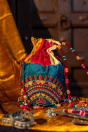 Shamiyana Aari hand embroidered mirror work potli by Craftroots.