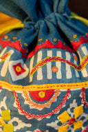 Handmade Chanderi blue potli with mirror and bead work
