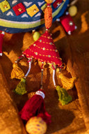 Artisan handcrafted blue potli with patchwork and intricate handwork.