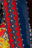 Handmade blue appliqué potli featuring traditional Indian embroidery and beadwork.