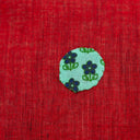 Red decorative cushion cover with embroidered animal motifs