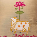 Cream cotton cushion cover with embroidered cow motif
