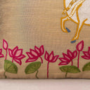 Cream cushion cover with pink lotus and green leaves
