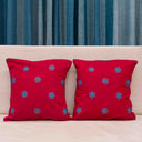 Red cotton cushion cover with blue decorative embroidery