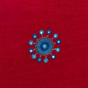Red square cushion cover with traditional-style detailing