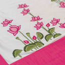 Cream floral bedsheet set with matching pillow and cushion covers
