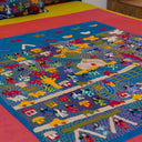 Blue cotton bedsheet with colourful Banaras Kanta patchwork

