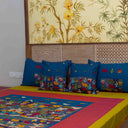 Blue cotton bedsheet with matching pillow covers
