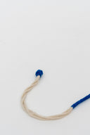 Blue Riwaayat Tara Handmade Rakhi with Hand-Embroidered Floral Fabric Beads