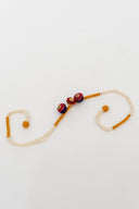 Mustard Riwaayat Triveni Handmade Rakhi with Hand-Embroidered Fabric Beads