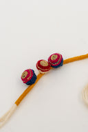 Mustard Riwaayat Triveni Handmade Rakhi with Hand-Embroidered Fabric Beads