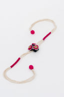 Pink Riwaayat Tara Handmade Rakhi with Hand-Embroidered Floral Fabric Beads