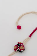 Pink Riwaayat Tara Handmade Rakhi with Hand-Embroidered Floral Fabric Beads