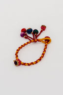 Mustard Rangrez Lumba Rakhi – Handcrafted Thread Bhabhi Rakhi