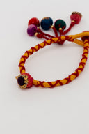 Mustard Rangrez Lumba Rakhi – Handcrafted Thread Bhabhi Rakhi