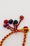 Mustard Rangrez Lumba Rakhi – Handcrafted Thread Bhabhi Rakhi