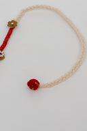 Red Karigari Dorr Rakhi – Hand-Braided Handmade Thread & Brass Rakhi