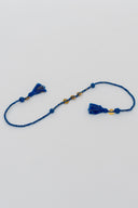 Blue Karigari Ikat Rakhi – Handcrafted Handwoven Ikat Fabric Rakhi