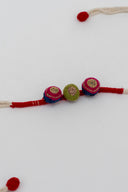 Red Riwaayat Triveni Handmade Rakhi with Hand-Embroidered Fabric Beads