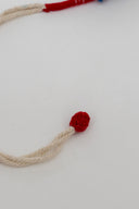 Red Riwaayat Triveni Handmade Rakhi with Hand-Embroidered Fabric Beads