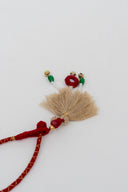 Maroon Tarang Lumba Rakhi – Handcrafted Thread, Beads & Mirror Bhabhi Rakhi