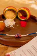 Blue Riwaayat Tara Handmade Rakhi with Hand-Embroidered Floral Fabric Beads