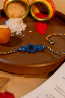 Blue Karigari Noor Rakhi – Handcrafted Mirror Work Thread Rakhi