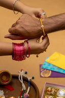 Mustard Karigari Dorr Rakhi – Hand-Braided Handmade Thread & Brass Rakhi