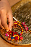 Mustard Rangrez Lumba Rakhi – Handcrafted Thread Bhabhi Rakhi