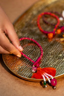 Maroon Veena Lumba Rakhi – Handcrafted Thread, Beads & Ghungroo Bhabhi Rakhi