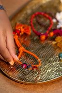 Handcrafted Orange Jhilmil Lumba Rakhi