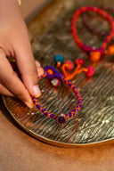 Purple Rangrez Lumba Rakhi – Handcrafted Thread Bhabhi Rakhi