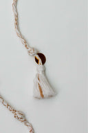 White Karigari Tejas Rakhi – Handcrafted Threads & Brass Rakhi